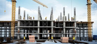 Construction worker with bricks