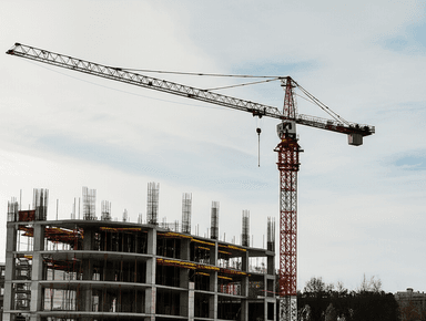 Construction cranes at building site