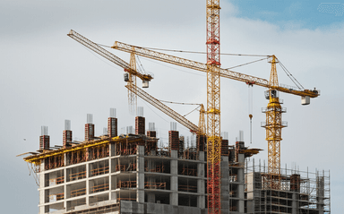 Construction crane and building frame