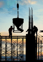 Construction worker with bricks