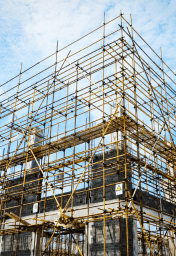 Construction cranes at building site